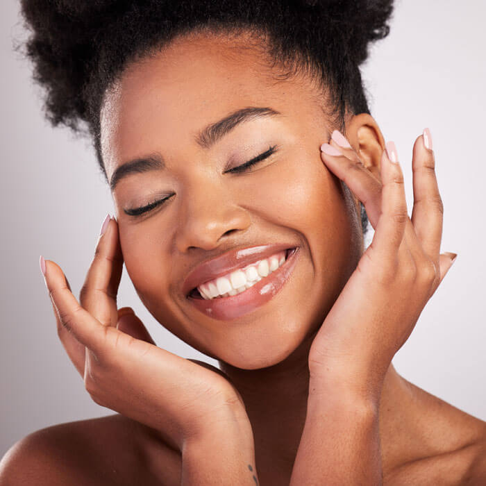 beautiful, smiling woman with great skin