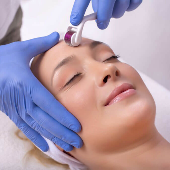 woman receiving microneedling treatment in Fort Worth, TX